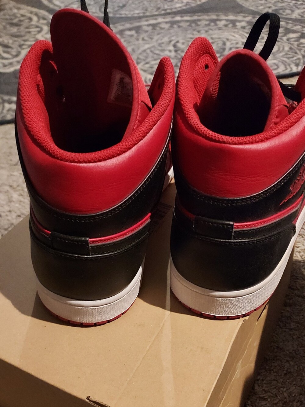 Nike Air Jordan 1 Mid Mens  Red and Black High-Top Sneakers